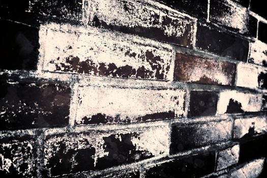 Aged and weathered old brick wall texture in a vintage retro design 