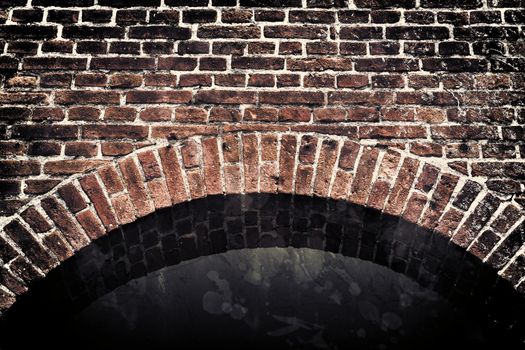 Aged and weathered old brick wall texture in a vintage retro design 