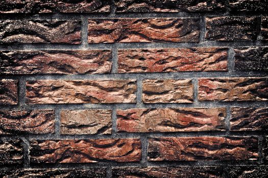 Aged and weathered old brick wall texture in a vintage retro design 