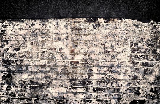 Aged and weathered old brick wall texture in a vintage retro design 