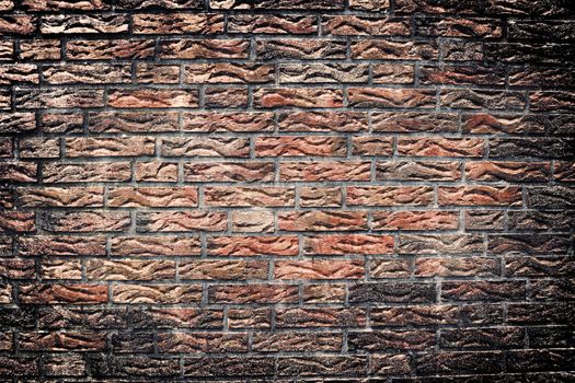 Aged and weathered old brick wall texture in a vintage retro design 