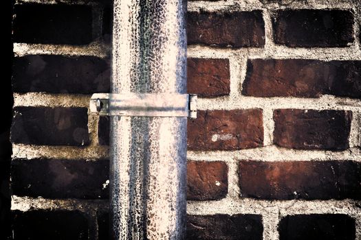 Aged and weathered old brick wall texture in a vintage retro design 