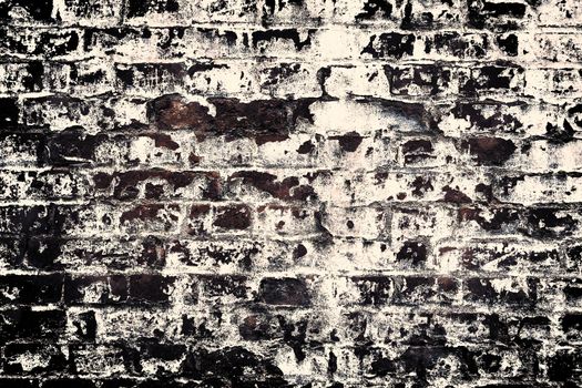 Aged and weathered old brick wall texture in a vintage retro design 