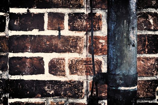 Aged and weathered old brick wall texture in a vintage retro design 