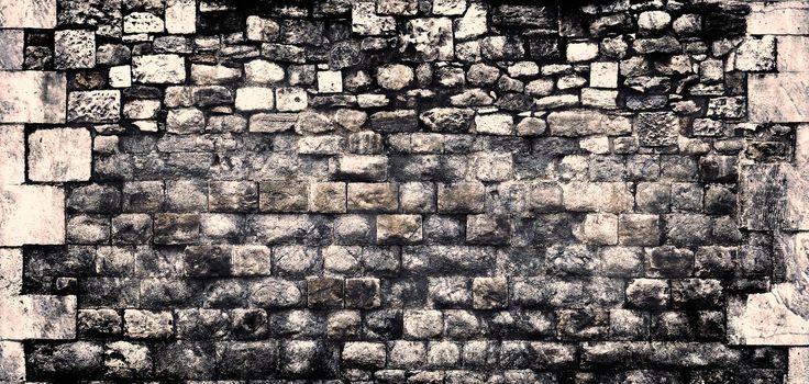 Aged and weathered old brick wall texture in a vintage retro design 