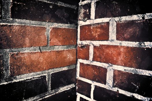 Aged and weathered old brick wall texture in a vintage retro design 