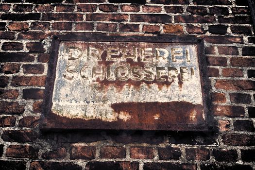 Aged and weathered old brick wall texture in a vintage retro design 