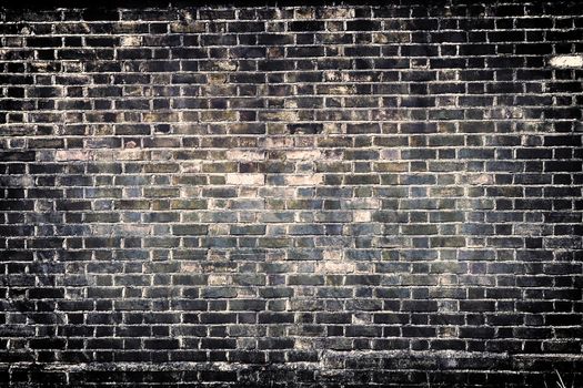 Aged and weathered old brick wall texture in a vintage retro design 