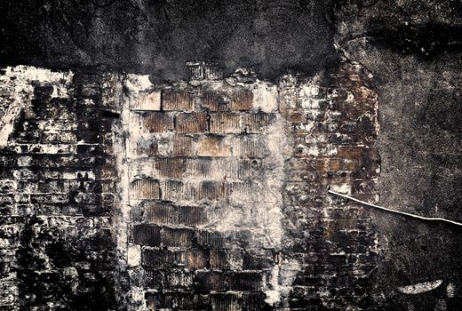 Aged and weathered old brick wall texture in a vintage retro design 