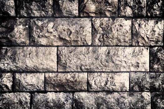 Aged and weathered old brick wall texture in a vintage retro design 