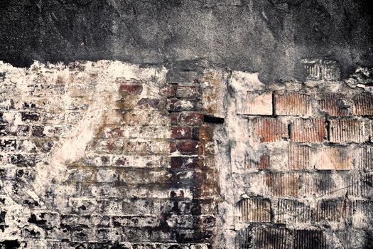 Aged and weathered old brick wall texture in a vintage retro design 