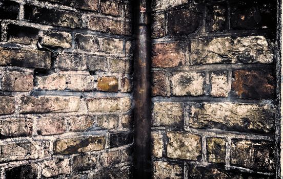 Aged and weathered old brick wall texture in a vintage retro design 