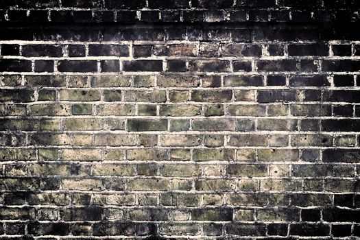 Aged and weathered old brick wall texture in a vintage retro design 