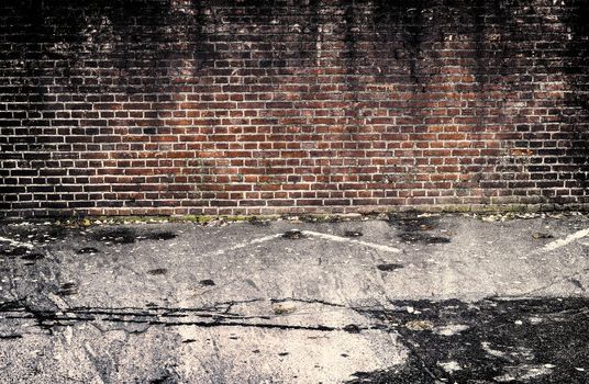 Aged and weathered old brick wall texture in a vintage retro design 