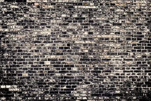 Aged and weathered old brick wall texture in a vintage retro design 