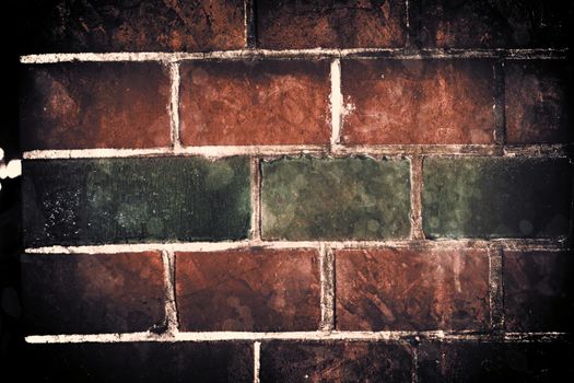 Aged and weathered old brick wall texture in a vintage retro design 