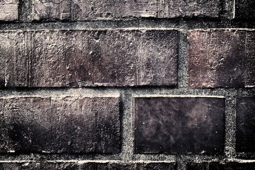 Aged and weathered old brick wall texture in a vintage retro design 