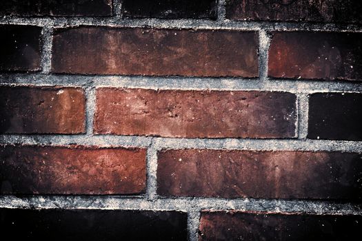 Aged and weathered old brick wall texture in a vintage retro design 