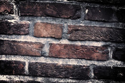 Aged and weathered old brick wall texture in a vintage retro design 