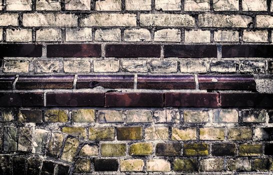 Aged and weathered old brick wall texture in a vintage retro design 