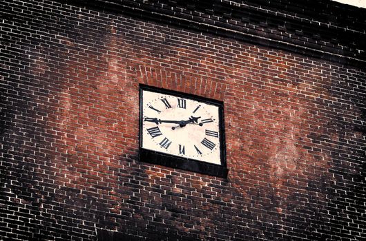 Aged and weathered old brick wall texture in a vintage retro design 