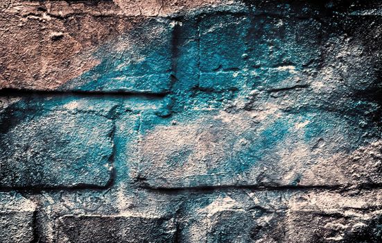 Aged and weathered old brick wall texture in a vintage retro design 