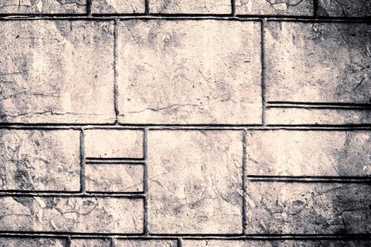 Aged and weathered old brick wall texture in a vintage retro design 