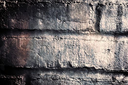 Aged and weathered old brick wall texture in a vintage retro design 