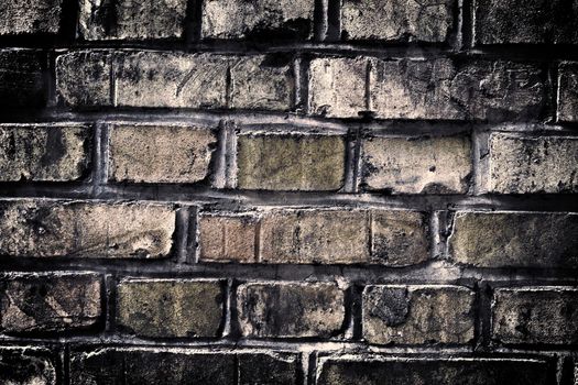 Aged and weathered old brick wall texture in a vintage retro design 