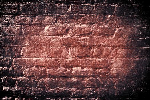 Aged and weathered old brick wall texture in a vintage retro design 