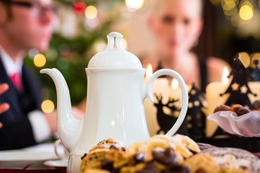 Family having traditional Christmas coffee