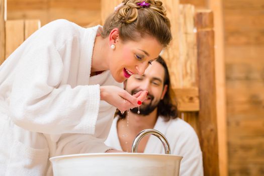 Couple at wellness spa enjoying romantic trip