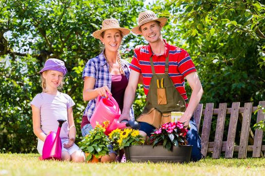 Family gardening in garden working