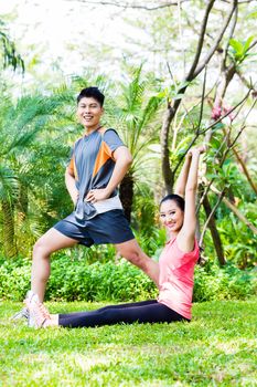 Asian Chinese couple at outdoor fitness training