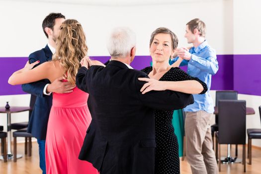 Group of people dancing in dance class having fun