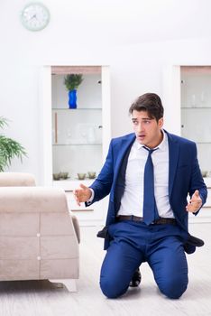 Bankrupt businessman angry and upset at home