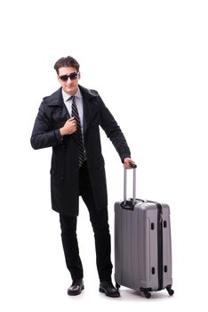 Young businessman with suitcase ready for business trip on white
