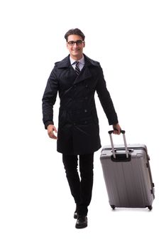 Young businessman with suitcase ready for business trip on white