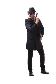 Man spy with handgun isolated on white background