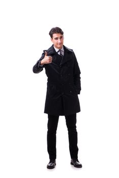 Young businessman wearing winter coat isolated on white