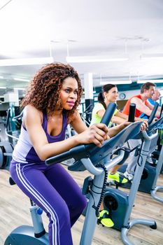 Diversity group of young and senior, Caucasian and black people on treadmill in gym