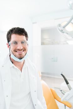 Dentist standing in dental surgery