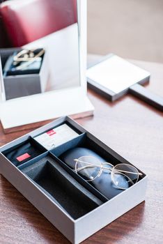 New glasses in present box at optician store