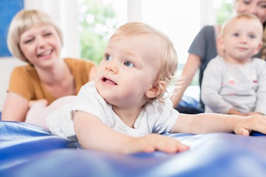Babies and moms in postnatal mother and child course