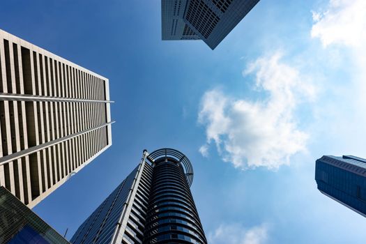 SINGAPORE - MAR 30: View of skyscrapers in Marina Bay on March 30, 2020 in Singapore. Singapore is the world's fourth leading financial centre.  UOB Building and One Raffles place