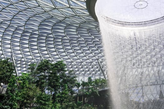 Singapore,Singapore - December 28, 2019 : Jewel Changi Aiport at night which connecting to Terminal 1 Arrival and Terminal 2,3 through linked bridge