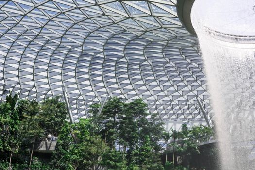 Singapore,Singapore - December 28, 2019 : Jewel Changi Aiport at night which connecting to Terminal 1 Arrival and Terminal 2,3 through linked bridge