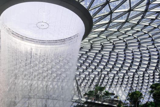 Singapore,Singapore - December 28, 2019 : Jewel Changi Aiport at night which connecting to Terminal 1 Arrival and Terminal 2,3 through linked bridge