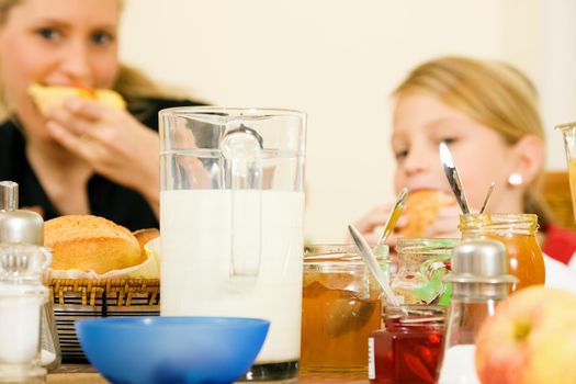 Family eating breakfast (focus on food!)