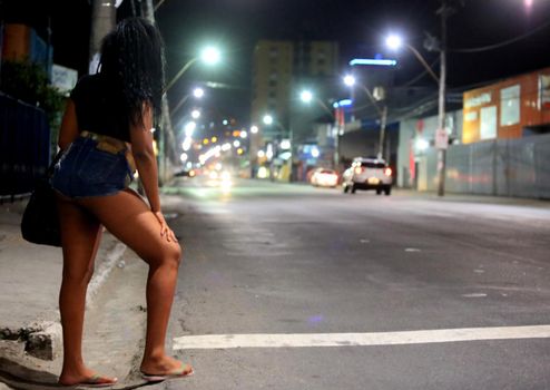 salvador, bahia / brazil - october 5, 2015: a transvestite who acts as a prostitute is seen on the street in the Roma neighborhood in the city of Salvador.
